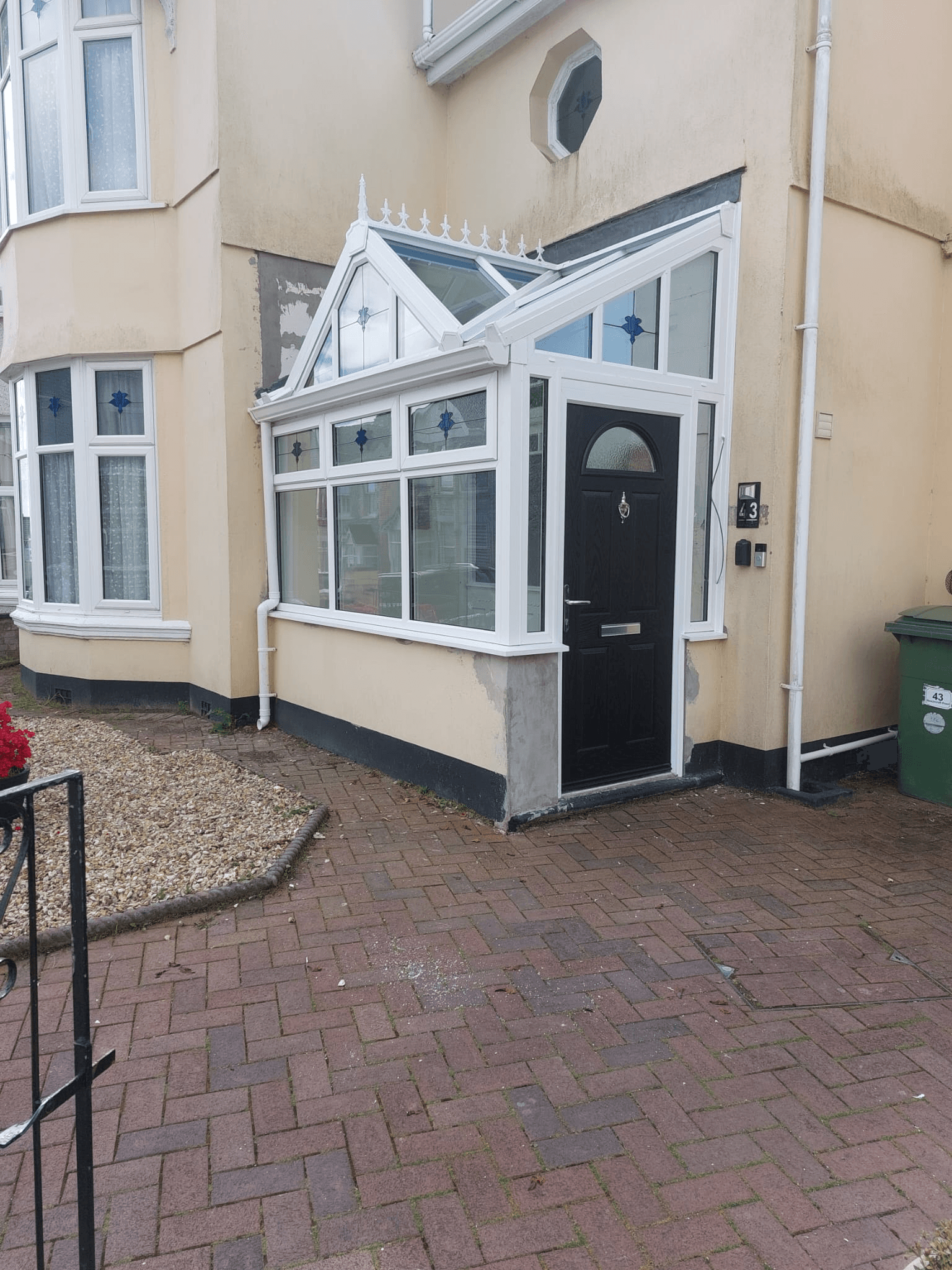 UPVC conservatory porch with composite door fitted